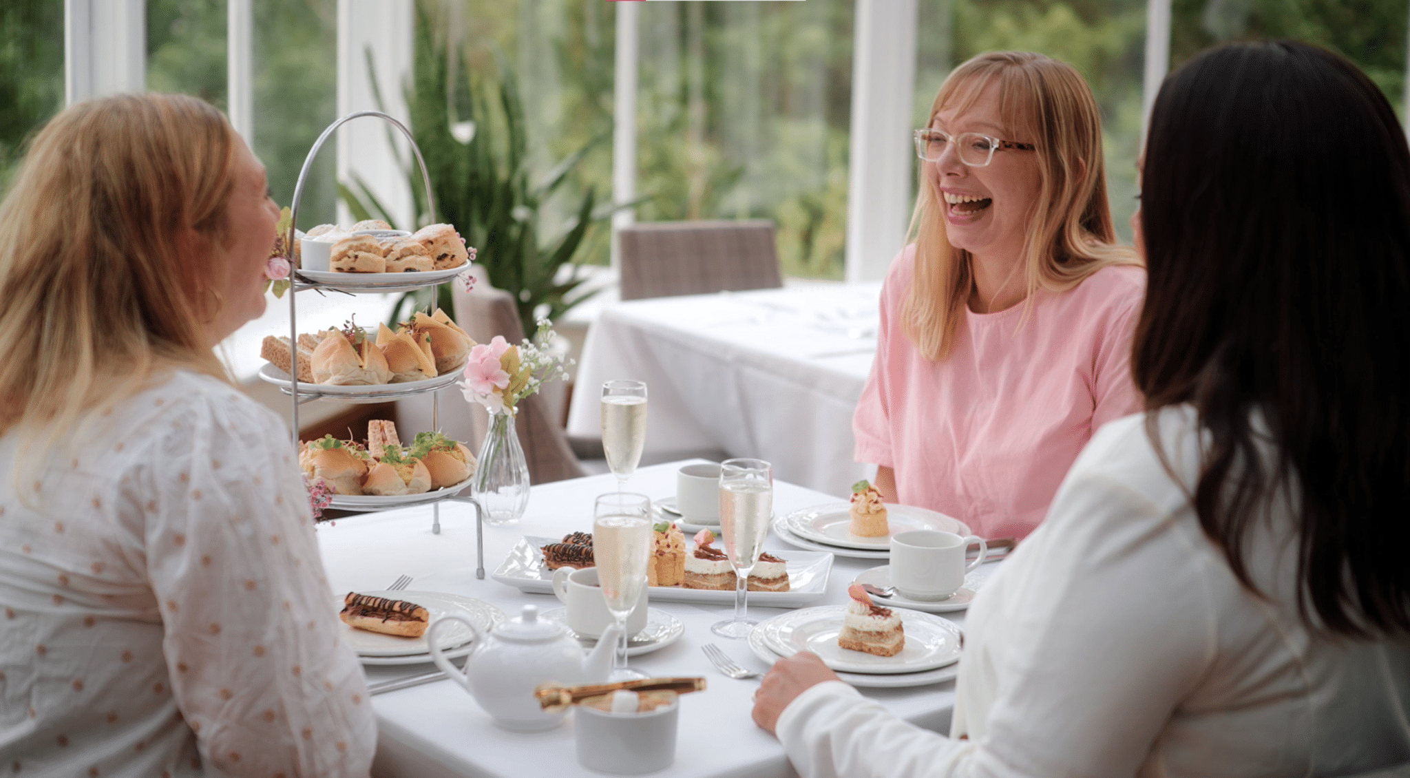 Three ladies enjoying afternoon tea